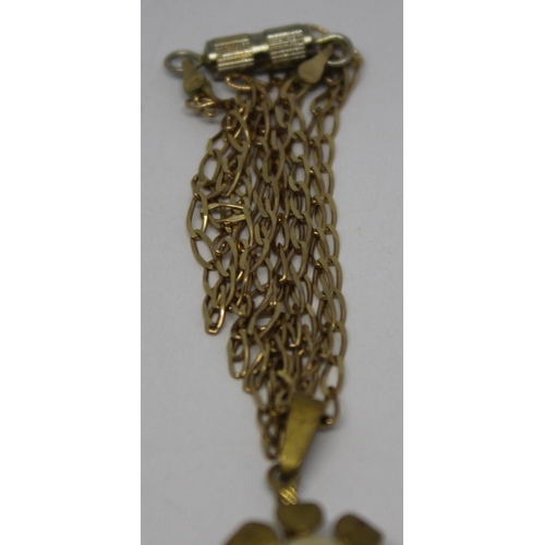 297 - 9ct GOLD CHAIN (3g) WITH PEARL FLOWER PENDANT