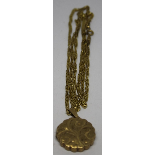 300 - 9ct GOLD LOCKET AND CHAIN 7.9g