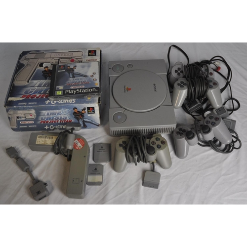 137 - SONY PLAYSTATION WITH TIME CRISIS PROJECT GAME, GUN, MULTITAP, 2 MEMORY CARDS, 4 CONTROLLERS AND LEA... 