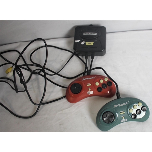 157 - MEGA DRIVE UNIT WITH 2 SEGA TOYS STREET FIGHTER II CONTROLLERS