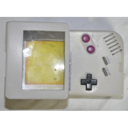 199 - NINTENDO GAMEBOY (TMG-01) WITH MAGNIFYER ATTACHMENT AND 2 GAMES