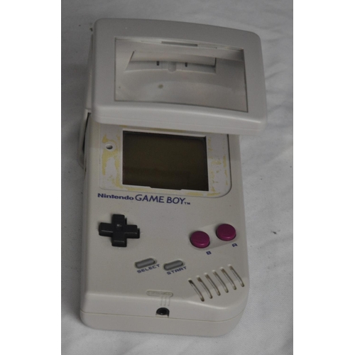 199 - NINTENDO GAMEBOY (TMG-01) WITH MAGNIFYER ATTACHMENT AND 2 GAMES