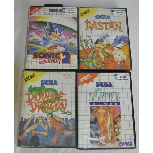 223 - 1 SEGA MASTER SYSTEM CONSOLE, 2 CONTROL PADS AND 4 BOXED GAMES, AC ADAPTER