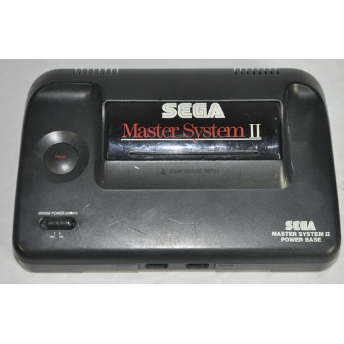 223 - 1 SEGA MASTER SYSTEM CONSOLE, 2 CONTROL PADS AND 4 BOXED GAMES, AC ADAPTER