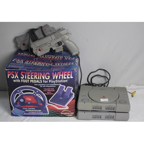 415 - 2 SONY PLAYSTATION CONSOLES, PSX STEERING WHEEL WITH FOOT PEDALS FOR PLAYSTATION & 2 NAMCO NPC-1... 