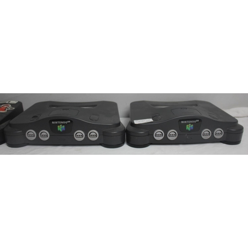 442 - 3 NINTENDO 64 CONSOLES, CONTROLLER PAK (NUS-004), EXPANSION PAK BOX (EMPTY) & SUPER MULTITAP