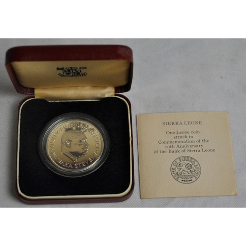 478 - 2 ONE LEONE COINS IN PRESENTATION BOXES WITH PAPERWORK IN COMMEMORATION OF THE 10th ANNIVERSARY OF T... 