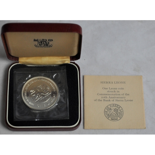 478 - 2 ONE LEONE COINS IN PRESENTATION BOXES WITH PAPERWORK IN COMMEMORATION OF THE 10th ANNIVERSARY OF T... 