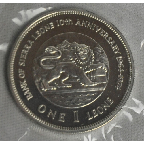 478 - 2 ONE LEONE COINS IN PRESENTATION BOXES WITH PAPERWORK IN COMMEMORATION OF THE 10th ANNIVERSARY OF T... 