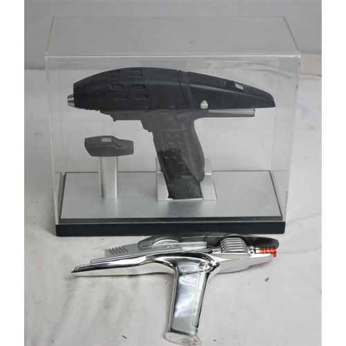 498 - 2 STAR TREK PHASERS - 1 IN DISPLAY CASE & 1 ON STAND