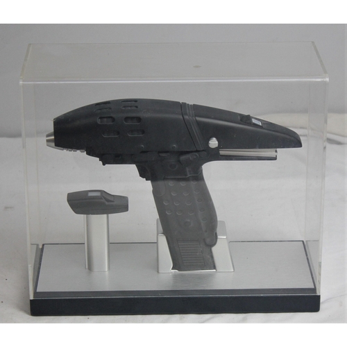 498 - 2 STAR TREK PHASERS - 1 IN DISPLAY CASE & 1 ON STAND