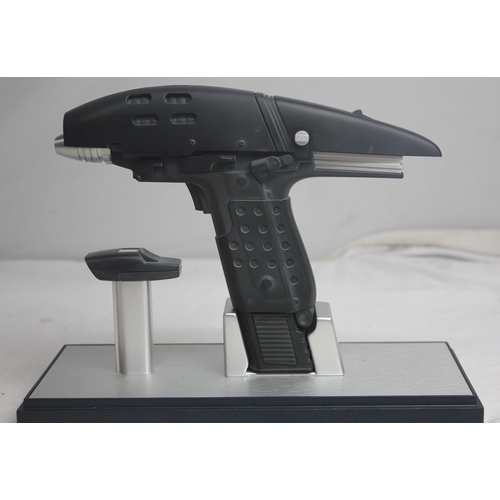 498 - 2 STAR TREK PHASERS - 1 IN DISPLAY CASE & 1 ON STAND