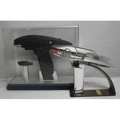 498 - 2 STAR TREK PHASERS - 1 IN DISPLAY CASE & 1 ON STAND