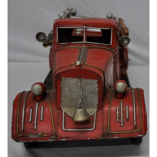 101 - TIN SCALE MODEL FIRE TRUCK