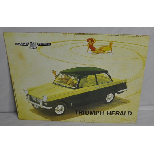 123 - 4 TIN ADVERTISMENT PLAQUES - TRUIMPH HERALD, MORRIS TRAVELLER, LAND ROVER AND ROYAL ENFIELD