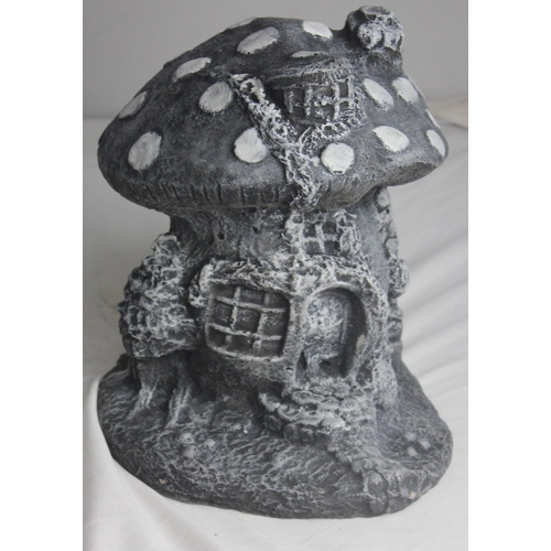 299 - 2 GARDEN ORNAMENTS - 1 TOADSTOOL FAIRY HOUSE AND 1 BUDDHA