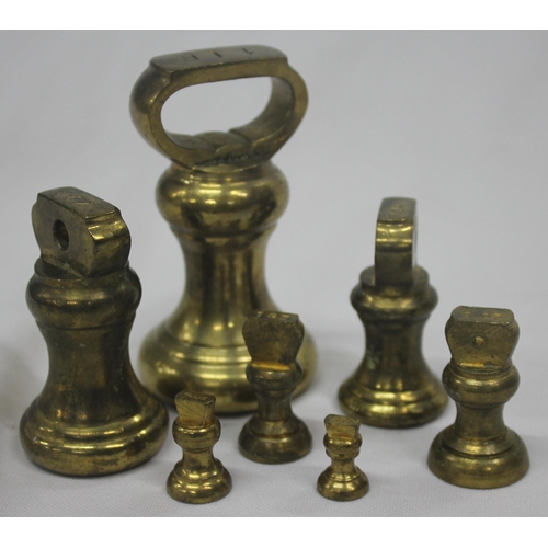 345 - PAIR OF BRASS DICKENS CHARACTER FIGURES AND BRASS WEIGHTS