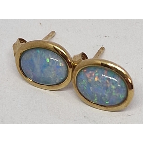 366 - PAIR OVAL OPAL STUD EARRINGS -MARKED 375 (1.4g)