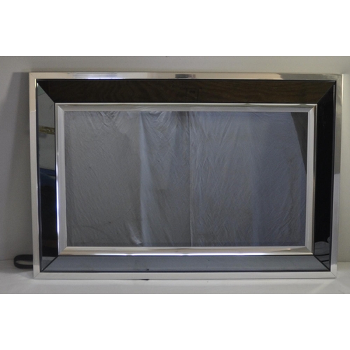 11 - CHROME AND GLASS TV PICTURE FRAME