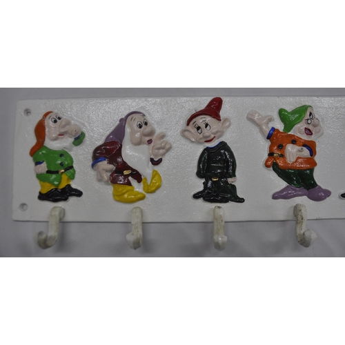 58 - CAST IRON CUP RACK - 7 DWARFS