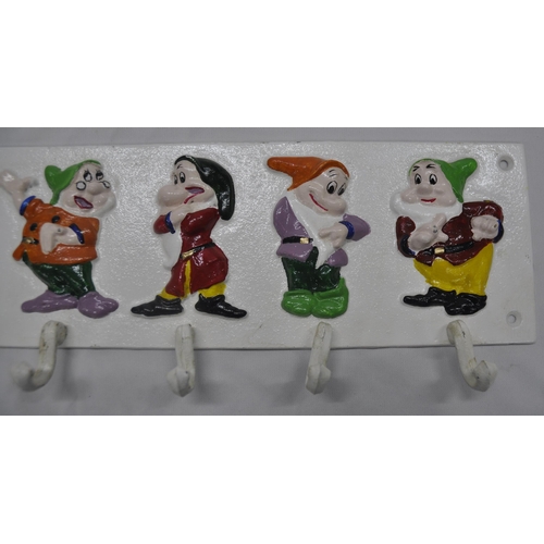 58 - CAST IRON CUP RACK - 7 DWARFS