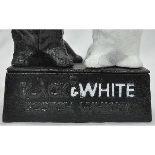 110 - BLACK AND WHITE WHISKY DOGS FIGURE