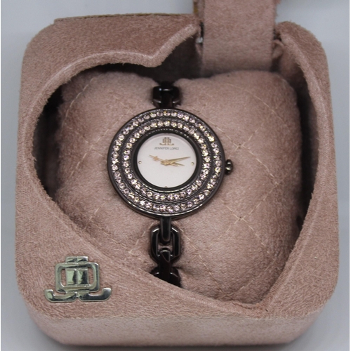 432 - NEW JENNIFER LOPEZ WATCH WITH STONE SET FACE WITH PAPERS IN PINK PRESENTATION BOX