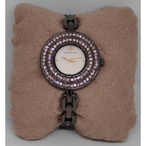 432 - NEW JENNIFER LOPEZ WATCH WITH STONE SET FACE WITH PAPERS IN PINK PRESENTATION BOX