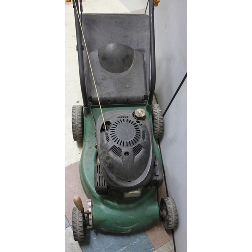 17 - PETROL LAWNMOWER. WE HAVE A VIDEO OF THIS RUNNING THAT CAN BE SENT VIA EMAIL