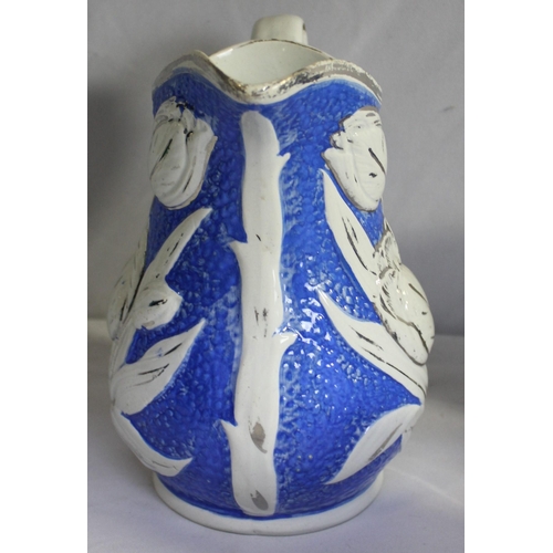 149 - 23 JAMES DUDSON VICTORIAN BLUE AND WHITE STONEWARE MOULDED TULIP JUGS