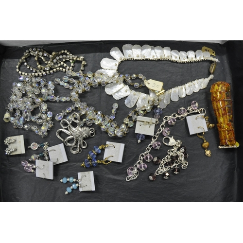 228 - 4 TRAYS OF COSTUME JEWELLERY