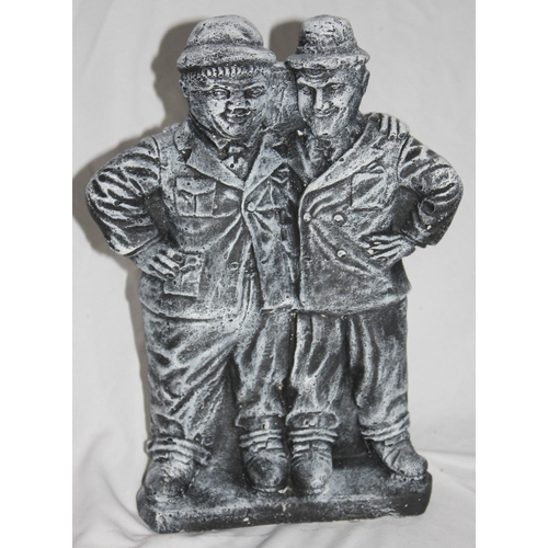 246 - 2 GARDEN ORNAMENTS - 1 LAUREL AND HARDY GARDEN ORNAMENT AND 1 LEPRECHAUN GARDEN ORNAMENT