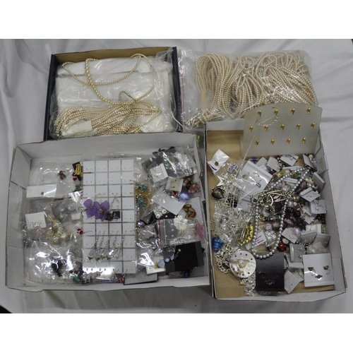 252 - 4 BOXES AND A BAG OF COSTUME JEWELLERY - EARRINGS, BEAD NECKLACES, ETC