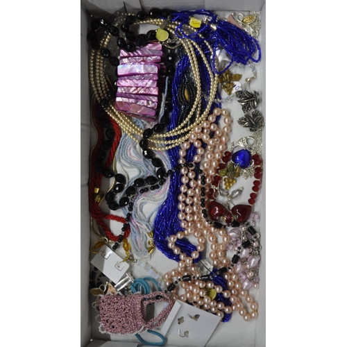 276 - 4 BOXES OF COSTUME JEWELLERY