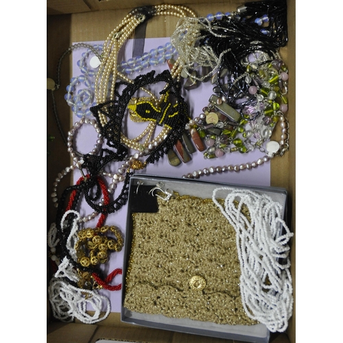 276 - 4 BOXES OF COSTUME JEWELLERY