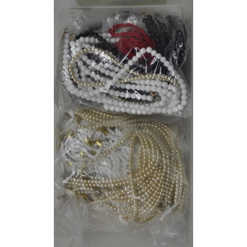 316 - 4 PLASTIC BOXES BEADED NECKLACES