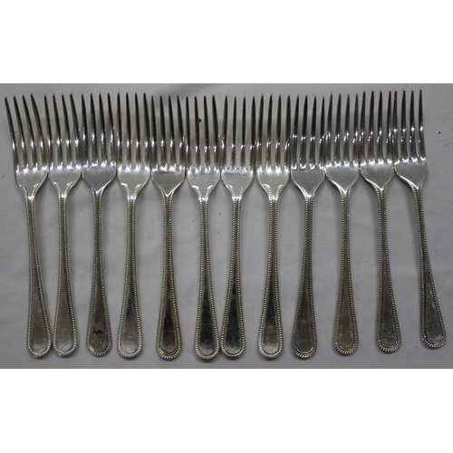 327 - SMALL BOX OF CUTLERY INCLUDING SILVER