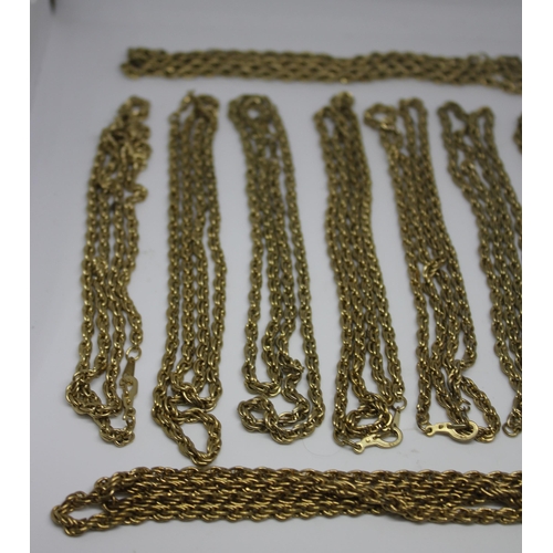 379 - MAROON JEWELLERY BOX & 9 ROPE CHAINS STAMPED 777