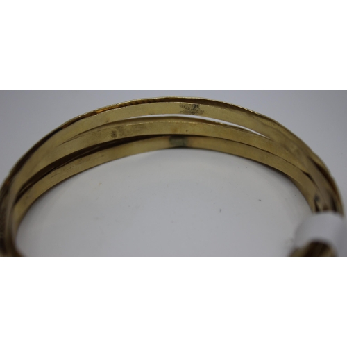 373 - SET OF 8 GOLD COLOUR BANGLES