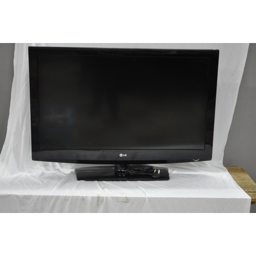 8 - LG 42LF2500 TV - NO REMOTE.  TESTED AND  WORKING