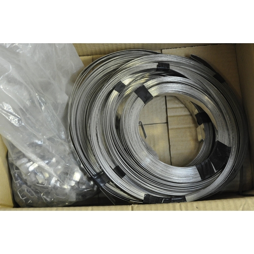 77 - BOX OF STAINLESS STEEL BANDING AND CLIPS