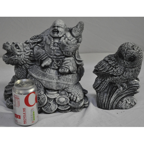 125 - 2 GARDEN ORNAMENTS - 1 BUDDHA SITTING ON DRAGON AND 1 OWL GARDEN ORNAMENT