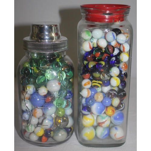 154 - 3 GLASS JARS, TUB AND BAG OF MARBLES