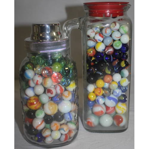 154 - 3 GLASS JARS, TUB AND BAG OF MARBLES