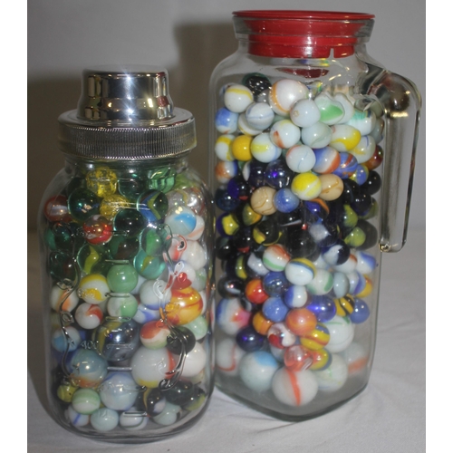 154 - 3 GLASS JARS, TUB AND BAG OF MARBLES