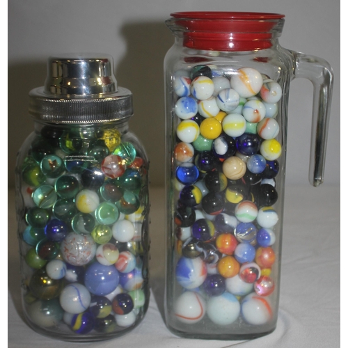 154 - 3 GLASS JARS, TUB AND BAG OF MARBLES