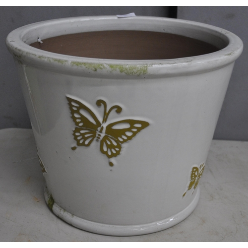 197 - BUTTERFLY DESIGN PLANTER AND 2 GRADUATED LADYBIRD DESIGN PLANTERS