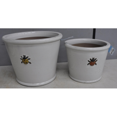 197 - BUTTERFLY DESIGN PLANTER AND 2 GRADUATED LADYBIRD DESIGN PLANTERS