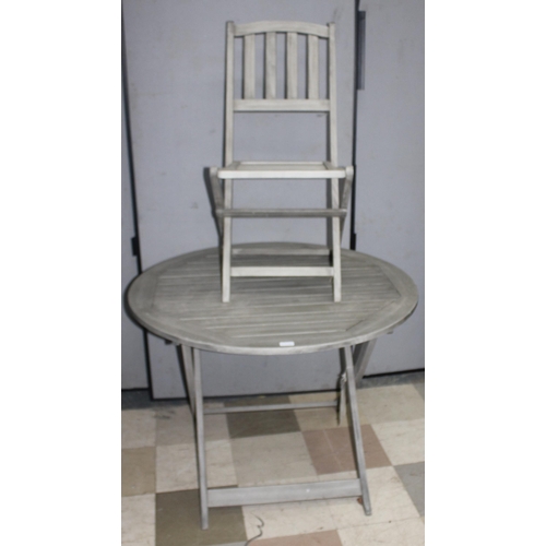 199 - HERITAGE GARDEN FOLDING TABLE AND 4 CHAIRS