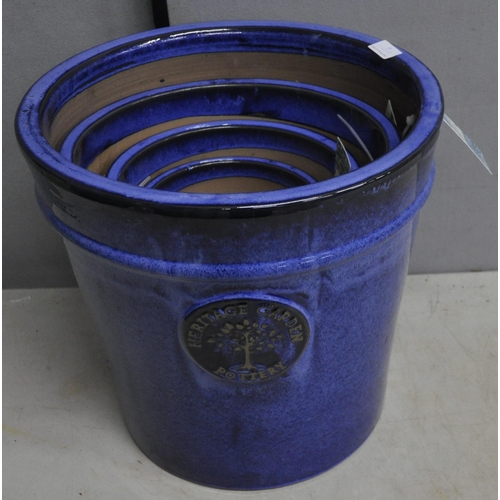 244 - SET OF 4 HERITAGE POTTERY BLUE GLAZED GRADUATED PLANTERS